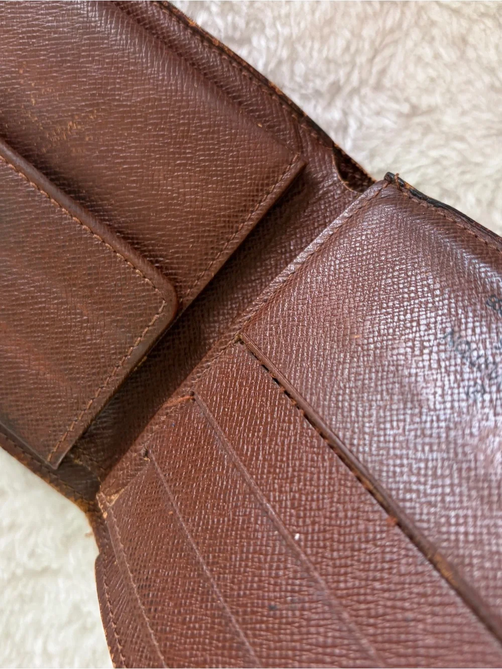 Louis Vuitton Men's Monogram Bi-Fold Wallet in Brown